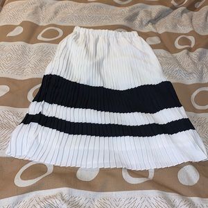 Black and white pleated midi skirt